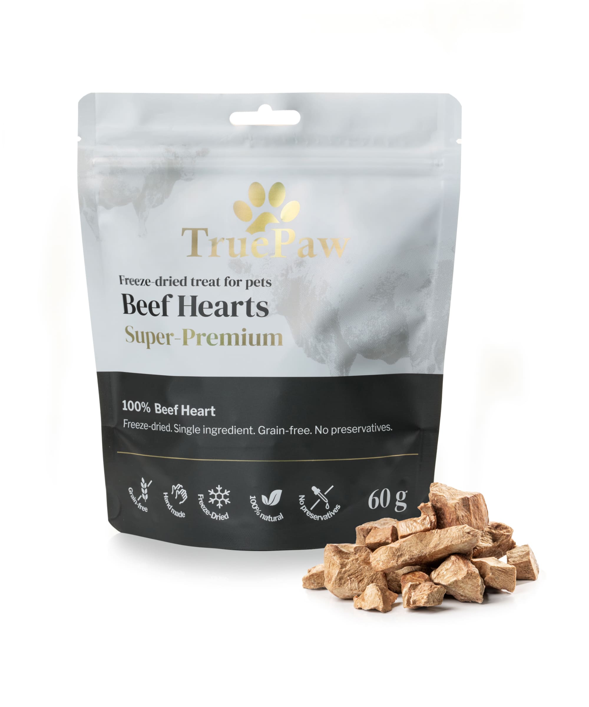 Freeze-dried beef hearts pet treats. Image shows a raw beef tongue above an arrow pointing down to sliced freeze-dried treats. Grain-free, handmade, 100% natural, no preservatives.