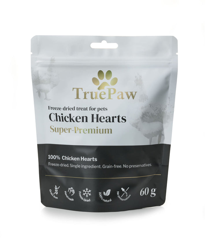 Freeze-dried chicken hearts pet treats. Image shows a raw beef tongue above an arrow pointing down to sliced freeze-dried treats. Grain-free, handmade, 100% natural, no preservatives.