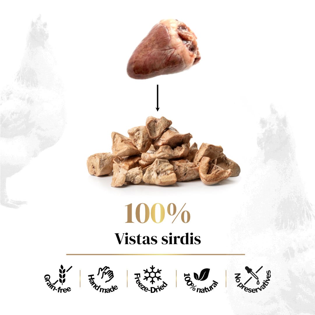 100% Vistas sirdis sublimēti kārumi dzīvniekiem. Attēlā redzama svaiga liellopa mēle, kas pārtop par kaltētiem gardumiem, un produkta īpašību ikonas: Grain-free, Hand made, Freeze-Dried, 100% natural, No preservatives.